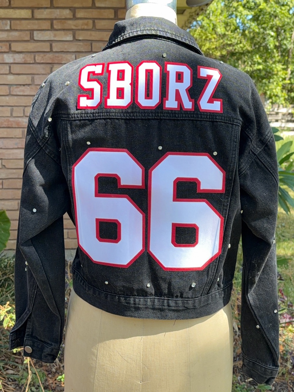 The Denim Blonde Black Rhinestone Custom Varsity 66 SBORZ Cropped Denim Jacket